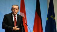 Le président turc Recep Tayyip Erdogan participe à une conférence de presse à Hambourg, après un sommet du G20, le 8 juillet 2017 [Patrik STOLLARZ / AFP/Archives]