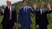 (g-d) le président américain Donald Trump, le Premier ministre canadien Justin Trudeau et le président français Emmanuel Macron, lors du sommet du G7 à La Malbaie, le 8 juin 2018 au Canada  [IAN LANGSDON/POOL / POOL/AFP]