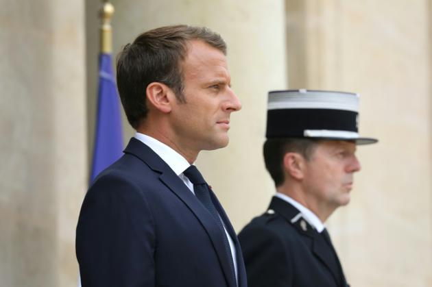 Le président français Emmanuel Macron (G) attend le Premier ministre israélien à l'Elysée le 5 juin 2018 [LUDOVIC MARIN / AFP]