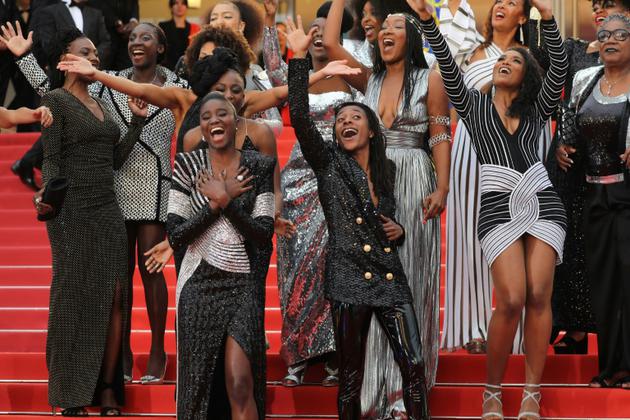 Actrices noires (et mulâtresses) manifestent pour dénoncer leur sous-représentation dans le cinéma en France, à Cannes le 16 mai 2018 [Valery HACHE / AFP]