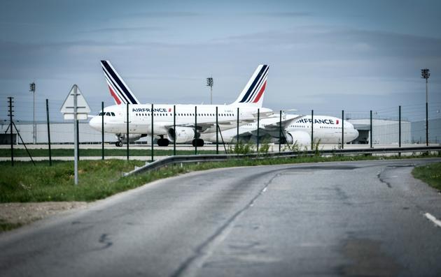 Des avions de la compagnie Air France sur le tarmac de l'aéroport Roissy-Charles-de-Gaulle, le 2 avril 2018, au nord de Paris [STEPHANE DE SAKUTIN / AFP]