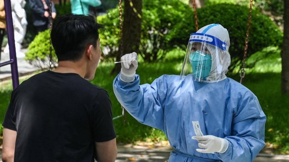 Covid-19 : la Chine atteint un niveau record de contaminations avec plus de 20.000 cas quotidiens