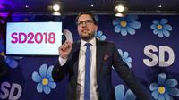  Jimmie Åkesson, des Démocrates de Suède (anti-immigration), s'exprime devant ses partisans à Stockholm le 9 septembre après les élections législatives. [Anders WIKLUND / TT News Agency/AFP]