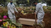 Enterrement d'un mort du Covid-19 au cimetière de Vila Formosa, près de Sao Paulo, au Brésil, le 20 mai 2020. [NELSON ALMEIDA / AFP]