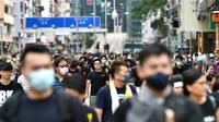 Des milliers de manifestants défilent le 11 août 2019 dans les rues de Hong Kong [Anthony WALLACE / AFP]