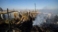Quartier de Valparaiso, au Chili, détruit par les flammes, le 14 avril 2014 [Martin Bernetti / AFP]