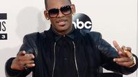 Le chanteur R. Kelly arrive aux American Music Awards à Los Angeles, en Californie, le 24 novembre 2013. [Frederic J. BROWN / AFP/Archives]