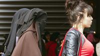 Une femme portant le niqab au Bourget, au nord de Paris, le 6 avril 2012 [Joel Saget / AFP/Archives]