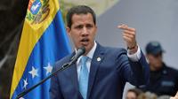 L'opposant vénézuélien et président autoproclamé Juan Guaido s'adresse à ses partisans à Caracas, le 19 avril 2019 [Federico Parra                       / AFP]