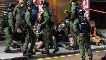 La police a arrêté plusieurs centaines de personnes dimanche lors d'une manifestation pro-démocratie