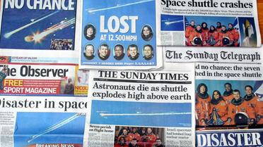 Les Unes des journaux au lendemain de l'accident de la navette spatiale Columbia, le 2 février 2003 [Odd Andersen / AFP/Archives]