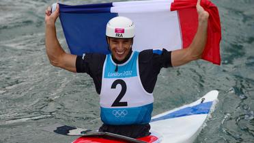 Le Français Tony Estanguet, sacré champion olympique de canoë (C1), aux JO de Londres le 31 juillet 2012. [Olivier Morin / AFP]