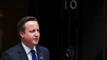 David Cameron devant le 10 Downing Street, le 2 août 2012 à Londres [Andrew Cowie / AFP/Archives]