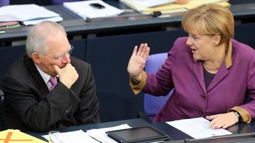 La chancelière allemande Angela Merkel et son ministre des Finances Wolfgang Schäuble au Bundestag à Berlin, le 20 novembre 2012 [Wolfgang Kumm / DPA/AFP/Archives]