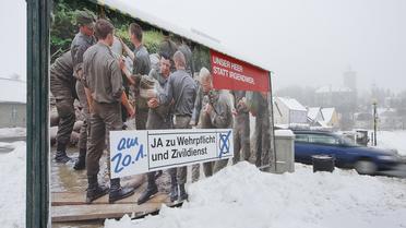 Un panneau de publicité pour la conscription dans l'armée autrichienne, à Vienne, le 20 janvier 2013 [Dieter Nagl / AFP]
