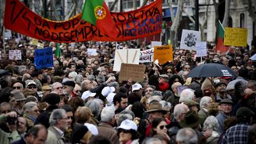 Des Portugais manifestent contre le plan d'aide de la troïka, le 2 mars 2013 à Lisbonne [Patricia de Melo Moreira / AFP/Archives]
