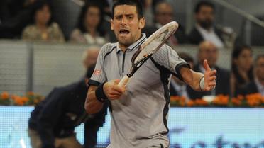 Le Serbe Novak Djokovic lors de la rencontre contre le Bulgare Grigor Dimitrov au 2e tour du tournoi ATP de Madrid, le 7 mai 2013 [Dominique Faget / AFP]
