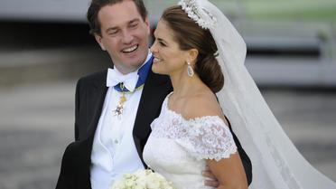 La princesse Madeleine de Suède (d) et son époux, le financier Christopher O'Neill, le 8 juin 2013 à Stockholm