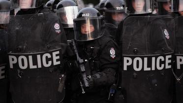 Des policiers canadiens, en 2010 à Toronto [Scott Olson / Getty Images/AFP/Archives]