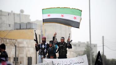 Des rebelles syriens à Alep, le 22 mars 2013 [Bulent Kilic / AFP/Archives]