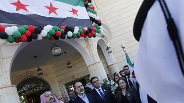 Ghassan Hito, leader de la délégation syrienne (C), au sommet arabe de Doha, le 27 mars 2013 [Karim Sahib / AFP]