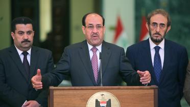 Le Premier ministre irakien Nouri al-Maliki (c), le 7 mai 2013 [Ahmad al-Rubaye / AFP/Archives]