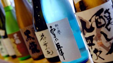 Des bouteilles de Saké [Stephane de Sakutin / AFP/Archives]