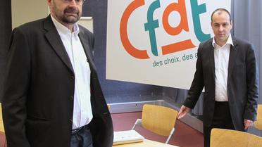Le secrétaire général de la CFDT, François Chérèque (g) et le secrétaire national, Laurent Berger (d), le 16 avril 2010, au siège de la CFDT à Paris [Jacques Demarthon / AFP/Archives]