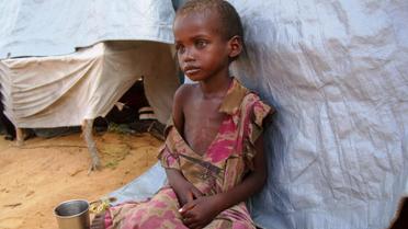 Un enfant somalien souffrant de malnutrition dans un camp de réfugiés à Mogadiscio [Mustafa Abdi / AFP/Archives]