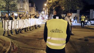 Des membres de Civitas lors d'une manifestation contre une pièce de théâtre, à Rennes, le 10 novembre 2011 [Damien Meyer / AFP/Archives]