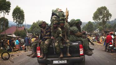 Des soldats de l'armée congolaise en route pour Kibumba, le 4 août 2012 en RDC [Michele Sibiloni / AFP/Archives]