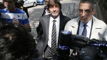 Michel Neyret à son arrivée le 4 septembre 2012 au conseil de discipline de la police à Paris [Patrick Kovarik / AFP/Archives]