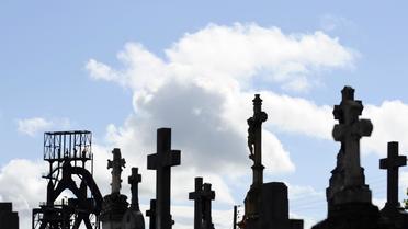 Dans un cimetière [Jean-Christophe Verhaegen / AFP/Archives]