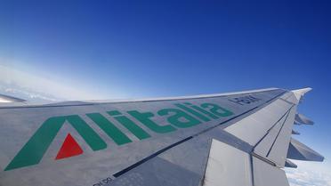 L'aile d'un avion de la compagnie aérienne Alitalia [Alexander Klein / AFP/Archives]