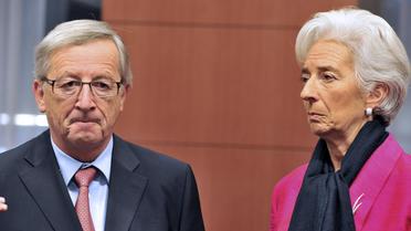 Le chef de file de l'Eurogroupe, Jean-Claude Juncker et la directrice du FMI Christine Lagarde, le 12 novembre 2012 à Bruxelles [Georges Gobet / AFP]