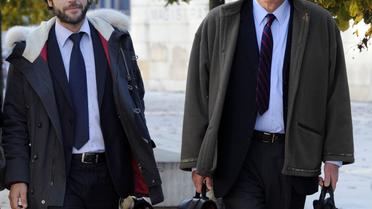 Patrice de Maistre (D) et son avocat Christophe Carriou Martin à leur arrivée le 13 novembre 2012 au palais de justice de Bordeaux [Jean-Pierre Muller / AFP/Archives]