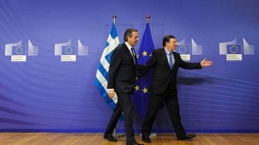 Le président de la commission européenne José Manuel Barroso accueille le Premier ministre grec Antonis Samaras à Bruxelles, le 13 novembre 2012 [John Thys / AFP/Archives]