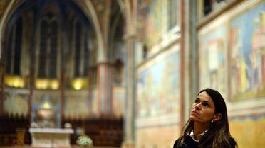 Aurélie Filippetti visite la basilique Saint-François d'Assises, le 23 novembre 2012 [Gabriel Bouys / AFP/Archives]