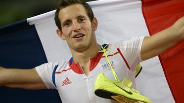 Renaud Lavillenie, champion olympique du saut à la perche lors des Jeux de Londres, le 10 août 2012 [Adrian Dennis / AFP/Archives]