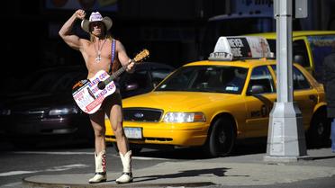 Pendant 13 ans, le "cow-boy nu" a fait régner sa loi sur Times Square à New York. Mais un "Indien nu" vient d'entrer dans la ville. La guerre est depuis déclarée.[AFP ]