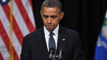 Obama lors de la cérémonie en mémoire aux victimes de la tuerie de l'école élémentaire de Newtown, le 16 décembre 2012 [Mandel Ngan / AFP/Archives]