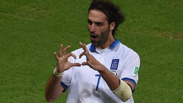 Georgios Samaras a offert à la Grèce sa place en huitièmes de finale en inscrivant un penalty dans les arrêts de jeu.