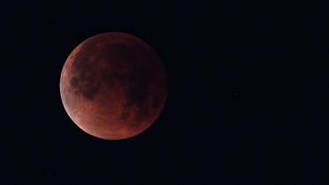 Eclipse de lune vue depuis Los Angeles le 31 janvier 2018 [Robyn Beck   / AFP/Archives]