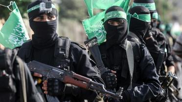 Combattants des brigades Ezzedine al-Qassam, la branche armée du Hamas, lors d'une parade le 20 juillet 2017 à Khan Younès, dans la bande de Gaza [SAID KHATIB / AFP/Archives]
