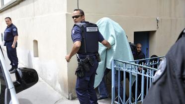 Matthieu, accusé d'avoir assassiné Agnès Marin, quitte le palais de Justice du Puy-en-Velay, le 18 juin 2013 [Thierry Zoccolan / AFP]