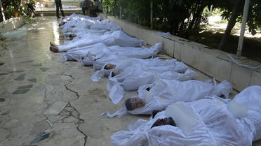 Photo de l'opposition syrienne montrant des cadavres d'enfants morts, selon elle, lors d'une attaque aux armes chimiques près de Damas, le 21 août 2013 [Ammar al-Arbini / Shaam News Network/AFP]