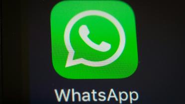 La messagerie mobile WhatsApp, filiale de Facebook, a annoncé lundi avoir franchi la barre symbolique du milliard d'utilisateurs, ce qui pose plus que jamais la question de son modèle économique [YASUYOSHI CHIBA / AFP/Archives]