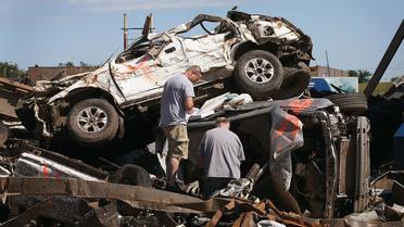 Des débris photographiés le 21 mai 2013 à Moore, après la tornade [Scott Olson / Getty Images/AFP]
