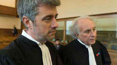L'avocat de Cécile Bourgeon Renaud Portejoie (G), au Puy-en-Velay le 30 janvier 2018 [Thierry Zoccolan / AFP/Archives]
