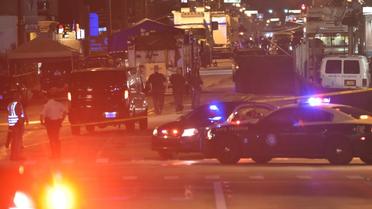 Des véhicules de police devant le night club de Orlando, le 12 juin 2016 [Mandel Ngan / AFP]